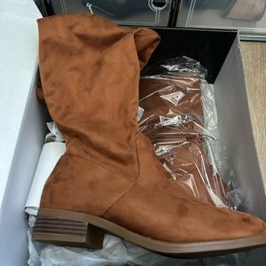 Brand new in box! Wide calf  above the knee high boots!